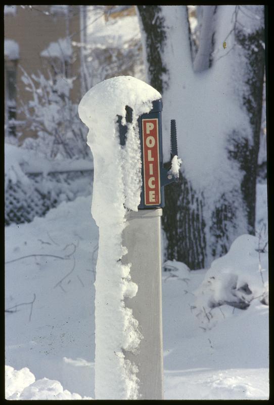 Police call box with snow