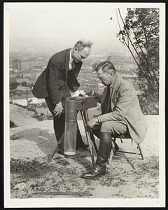 Seek Buried Treasure in Heart of Los Angeles. Rex Irving McCreery, an attorney, has obtained permission of the Los Angeles, Calif., County board of supervisors to dig for buried treasure on historic Fort Moore Hill over the broadway tunnel in Los Angeles. McCreery (left), is pictured with G. Warren Shufelt, Geophysical Engineer, at the spot where digging will begin on Feb. 27. Shufelt is operating his electrical radio gold finding machine, which, he says, has located five places on the Fort Moore property where gold is believed buried.