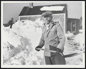 Cape Battles The Snow -- Cape Cod’s fight to dig out from under its worst snow storm in 50 years is typified by the stance of this rugged, unruffled New Englander.