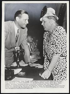 Philadelphia – At Democratic Resolutions Hearing – Former Gov. Maurice J. Tobin (left) of Massachusetts chats with Mrs. Emma Guffey MIller, Pennsylvania, official hostess for the Democratic national convention, before resumption today of hearing on resolutions. Tobin is presiding in absence of Sen. J. Francis Myers (d-pa), chairman.