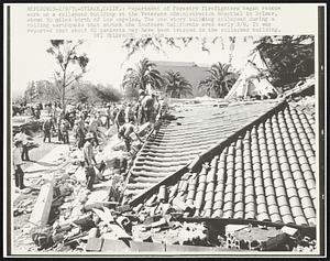 Department of Forestry firefighters began rescue work on a collapsed building at the Veterans Administration Hospital in Sylmar, about 30 miles north of Los Angeles. The one story building collapsed during a rolling earthquake that struck the Southern California area early 2/9. It was reported that about 60 patients may have been trapped in the collapsed building.