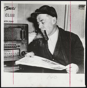 Waiting For The Word -- Louis Mushadilli, soft coal miner near Johnstown, Pa., listens to radio for developments in "no contract-no work" strike involving United Mine Workers.