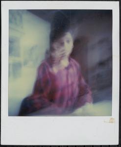 Young person in flannel shirt