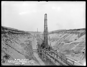 Wachusett Reservoir, North Dike, westerly portion, driving 6-inch sheeting, station 24, Clinton, Mass., May 11, 1900