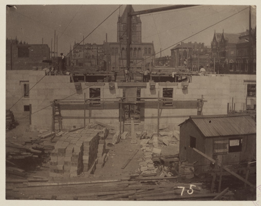 East wall of Courtyard under construction, construction of the McKim Building