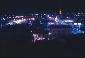 View from elevated area of city at night