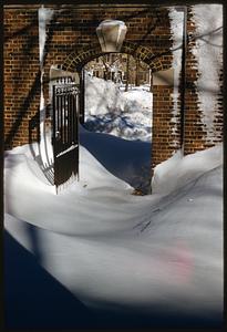 Open gate in snow drift