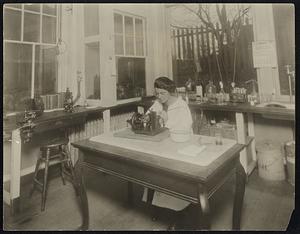Research was a major activity at Beth Israel long before the 1928 move to Brookline Avenue. Here a laboratory assistant is shown working in the Pathology Laboratory circa 1920