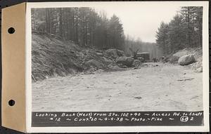 Contract No. 60, Access Roads to Shaft 12, Quabbin Aqueduct, Hardwick and Greenwich, looking back (west) from Sta. 102+40, Greenwich and Hardwick, Mass., Apr. 4, 1938