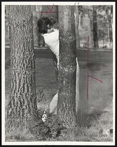 Trouble Spot -- Unsigned Bruin Derek Sanderson hits from behind tree on 17th hole during Pro-Celebrity tourney at Halifax Country Club.