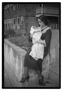 Mercedes Pasarell Sanromá holding a baby