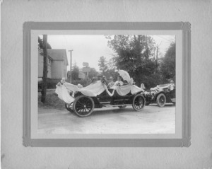Mr. and Mrs. E.L. Thompson in Parade Car