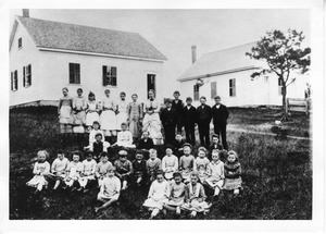 A group of schoolchildren outside the No. 6 School