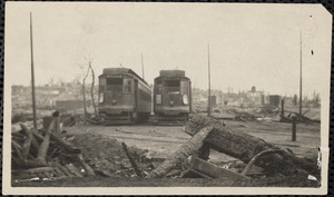 Two street cars and ruins of the Great Chelsea Fire