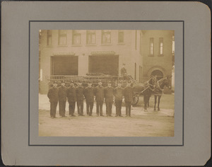 Photograph of firemen with a horse-drawn fire truck