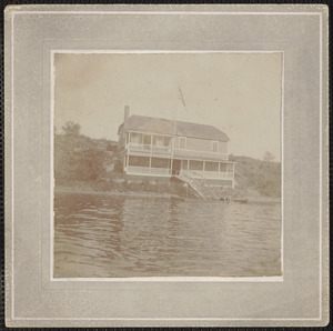Photograph of house by the water