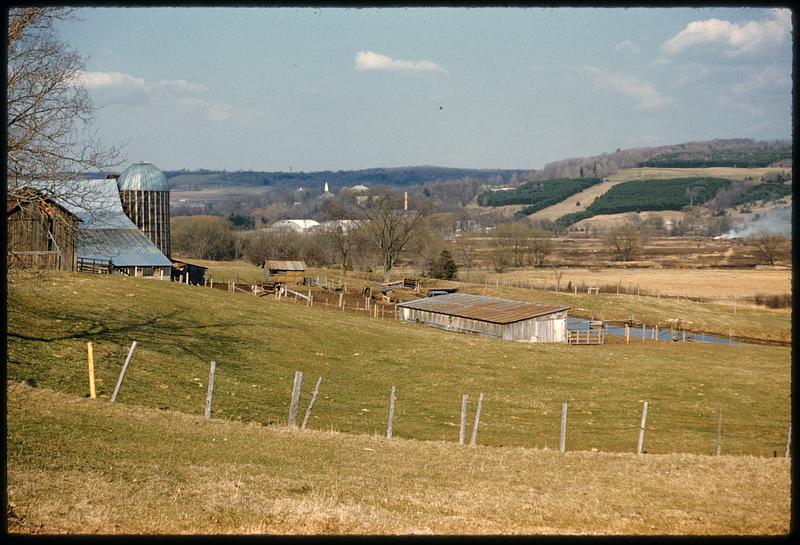 View of farm and surrounding landscape