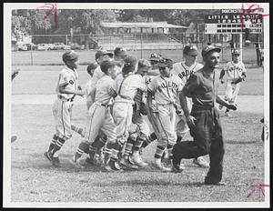 Mitey Mite Ruffy Mugica (without cap) is mobbed by jubilant teammates after he pitched Malden Central to a 6-2 victory over Parkway National at Si Rosenthal Field, Dorchester. Leading charge off the field is Manager Joe Zaia. The win puts Malden in the state Little League semifinal.