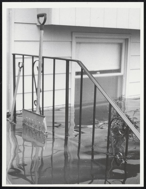 Railings half submerged by flood water