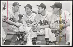 Manager Lou Boudreau Talks to his Kansas City outfielders, who also represent his power, about preventing a Red Sox sweep of the three-game series. Left to right, the gentlemen in the photo are Boudreau, Bill Renna, Gus Zernial and Bill Wilson.