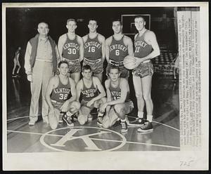 Kentucky Basketball Team--Coach Adolph Rupp is shown here with his Kentucky Wildcats who play Minnesota at Minneapolis tonight. Standing, left to right, are Rupp, Frank Ramsey (30), Luo Tsioropoulos (16), Cliff Hagan (6), and Shelby Linville (11). Kneeling, left to right, are Lucian (Skippy) Whitaker (32), Bobby Watson (38) and Billy Evans (42). Bill Spivey, seven-foot, point-scoring center is not shown. Spivey is out pending recovery from a knee operation.