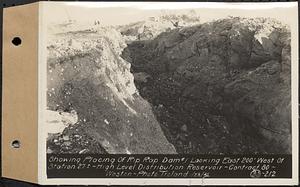 Contract No. 80, High Level Distribution Reservoir, Weston, showing placing of riprap dam 1, looking east 200 feet west of Sta. 27+/-, high level distribution reservoir, Weston, Mass., Jan. 23, 1940