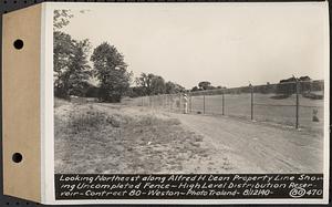 Contract No. 80, High Level Distribution Reservoir, Weston, looking northeast along Alfred H. Dean property line showing uncompleted fence, high level distribution reservoir, Weston, Mass., Aug. 12, 1940