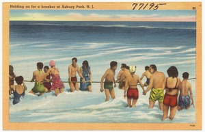 Holding on for a breaker at Asbury Park, N. J.