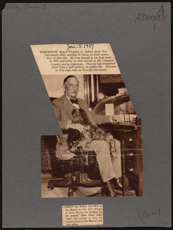 Charles S. Ashley seated with dog in lap