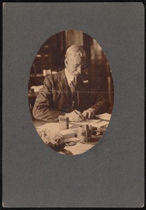 Alfred Bradley at writing desk