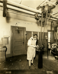 Female student working in the woodshop