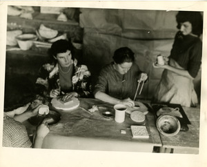 Students working in a ceramics studio