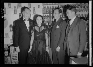 Ireene Wicker with three unidentified men with WAAB microphone