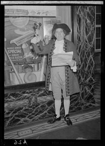 Town crier outside Gillette shop window display