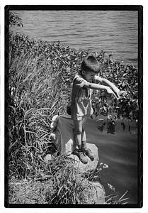Children by a body of water