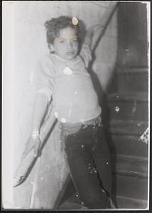 Kymio Postell posing on a staircase
