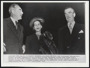 Diplomatic Exchange--Secretary of State Dean Acheson, at left, and Mrs. Acheson exchange pleasantries with British Foreign Secretary Anthony Eden before Eden's address to the United Nations General Assembly here today. The British diplomat submitted a counter-proposal to the adamant Russian stand on the deadlocked Korean peace negotiations.