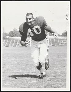 "Chuck" Shonta defensive halfback of the Boston "Pats", who picked up a loose ball and ran 30 yards for the winning touchdown against the N.Y. Titans.