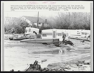 Trailer camp alongside highway 101 lies buried in mud as a result of 8-day rain storm which has caused at least 11 deaths in the Southern California area, all the result of mud slides. Forecasters are hopeful the storm may break 1/26.