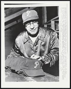 The red hats are coming -- that is, the Philadelphia red hats. Unpacking the new hats here at Jack Russell Stadium is equipment man Russell (Unk) Henry, veteran of 40 years with the Phillies, as he gets ready for the Philadelphia Phillies who will be reporting for early spring training next week.