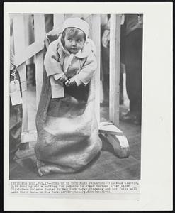 New York – Hung Up By Customary Procedure – Vicenza Giaccio, 3, is hung up while waiting for parents to clear customs after liner Cristoforo Colombo docked in New York today. Vicenza and her folks will make their home in New York.