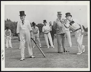 The Cricket Fields of England are not disturbed by robot bombs. These two village teams, wearing top hats and cravats, recently played the national game on a Southern England green the way it was played 100 years ago. Neither the roar of a flying bomb nor the thud which told it had struck interrupted them.