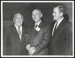 Trackmen Talk Shop - Jack LeDoux (center), president of the American Greyhound Track Operator's Association, chats with Joseph Linsey (left) managing director at Taunton, and George Carney, treasurer at Raynham in fall-summer meeting of AGTOA last night at Pier 4 restaurant.