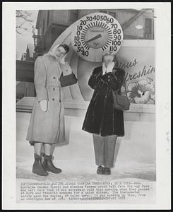 Girls Confirm Thermometer; It's Cold--Mrs. Lorraine Buccko (left) and Glenice Farmen could tell from the way face and ears felt that it was extremely cold this morning when they paused at Park and Franklin avenues for a quick shiver. The thermometer merely gave the degree, 24 below zero. It was warming up then, from an overnight low of -28.