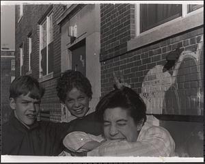 Brian Gomes, Kyle Postell and one other boy laughing