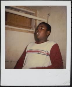 Young man in red and white shirt