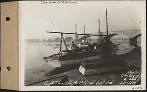 Captain Thurston, Mr. Hall and the boat used, Memorial Bridge, Connecticut River, Springfield, Mass., Dec. 15, 1928