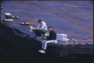 Two men on wharf, Boston