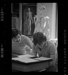 A student being taught in science classroom