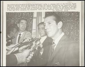 Billy Martin (right) talks to newsmen 10/2 at the Detroit Tigers office in Detroit where he was hired to manage the Tigers 10/2. Martin was reportedly given a two-year contract at $60,000 annually by Detroit General Manager Jim Campbell to succeed Mayo Smith, whose two-year pact at $55,000 per year ran out 10/1. Martin was fired less than a year ago after managing the Minnesota Twins to the American League West Division title.